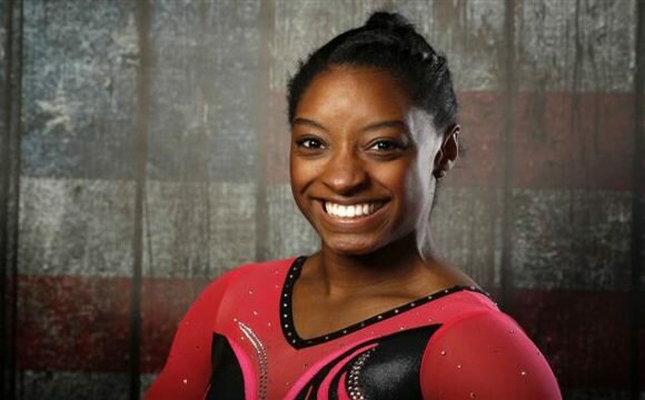 Atop the Gymnastics World, Simone Biles Can’t Suppress Her Grin