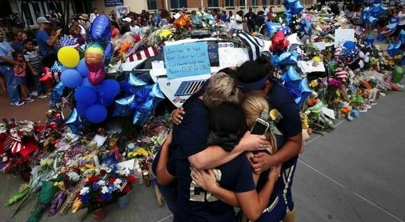 Two chapters in Dallas police shooting close as El Centro reopens, memorial clears